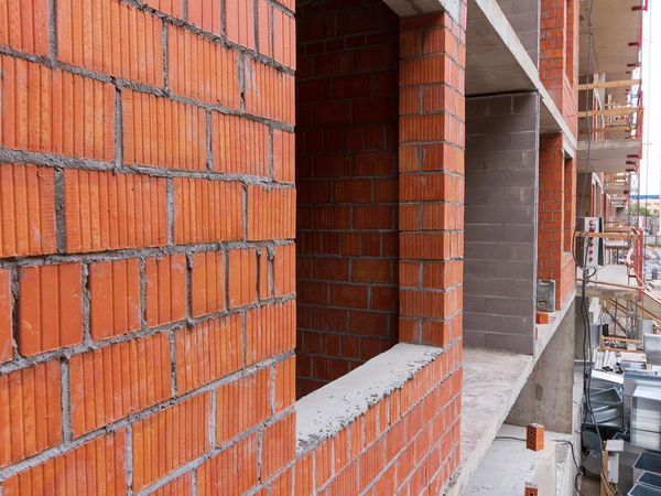 В ЖК «Полис на Московской» завершили наружную кладку стен